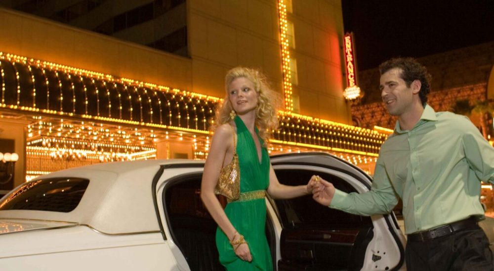 elegant-woman-and-man-with-limousine-at-night-2026-03-26-09-34-29-utc_11zon